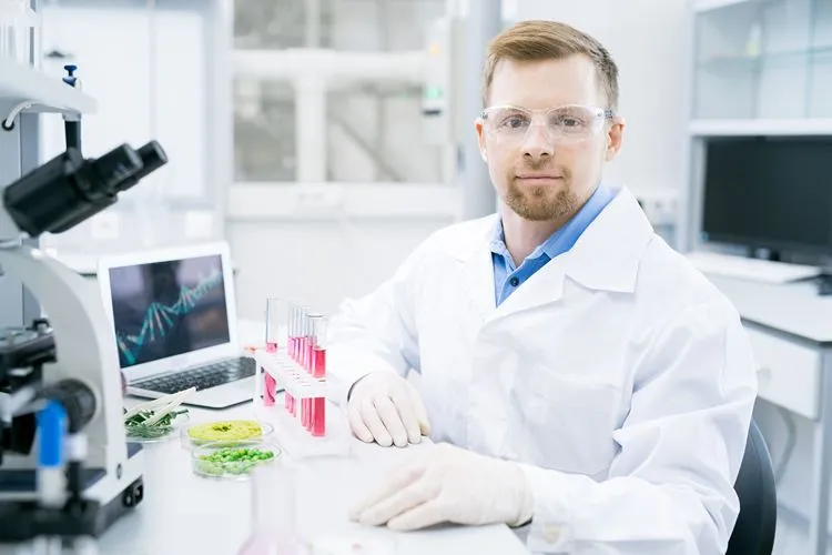 Researcher in laboratory studying gut microbiome samples — Akkermansia research has expanded rapidly over the past decade